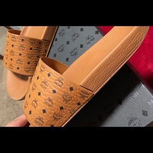 Mcm slides designer expensive
